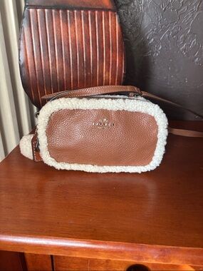 Coach North/South Phone Crossbody in Pebble Leather with Sherpa. Style F64706